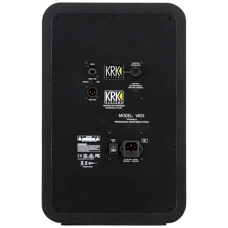 Panel posterior del monitor activo KRK V8S5 mostrando la entrada combo XLR/TRS, salida AES3, control rotatorio Function, puerto USB-C, conmutador de encendido y toma IEC.